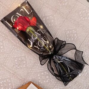 Artificial rose. Lovely rose to give as a gift. Has lights